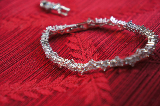 Charm bracelets with cubic zirconia